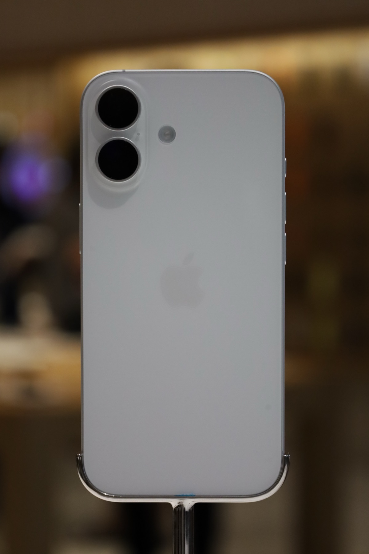 A white Apple iPhone 17 held in hand - the product line behind Apple's record 20% share of the global smartphone market in the second quarter of 2026