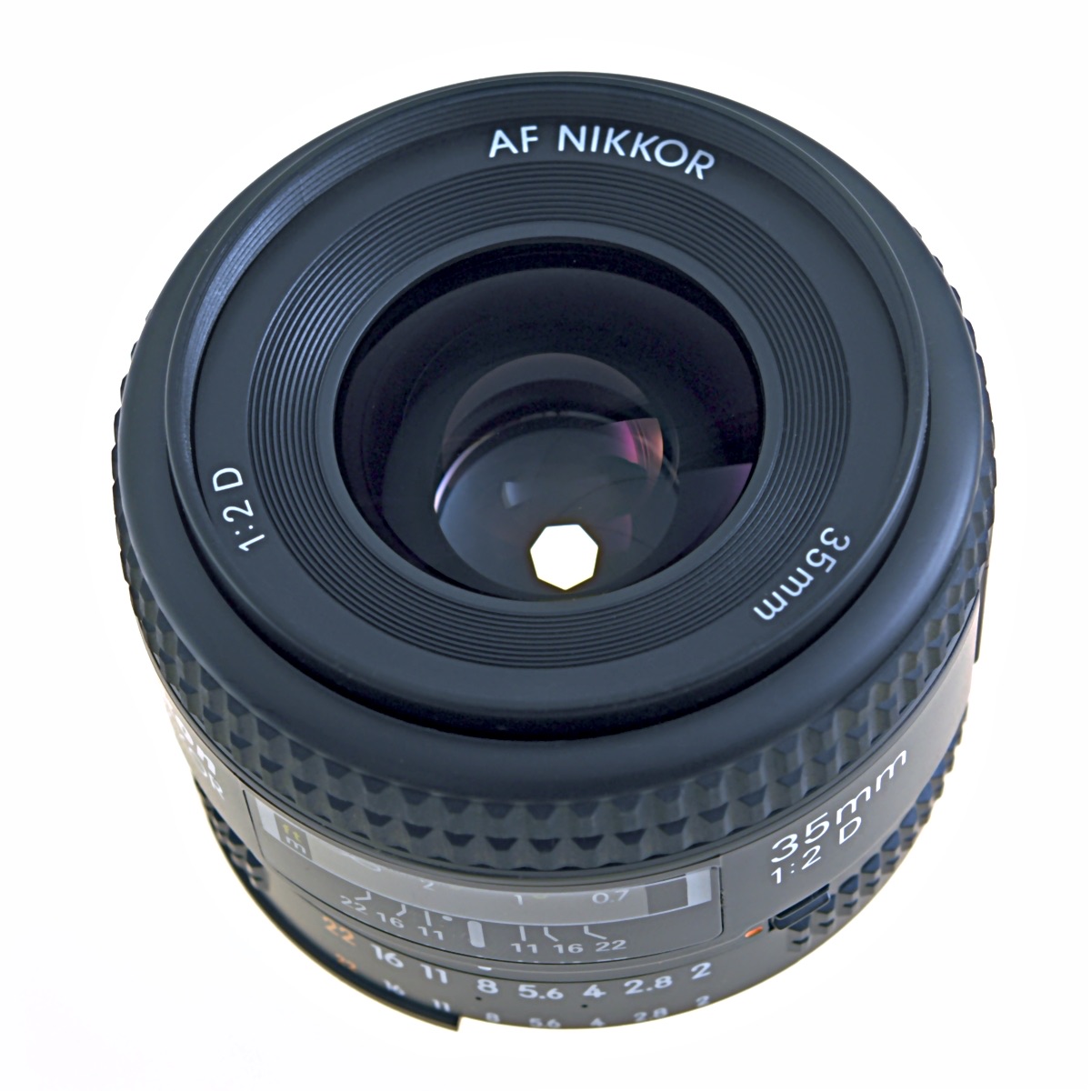 A close-up, top-down photo of a camera lens showing its aperture blades forming an adjustable iris opening - the kind of physical variable-aperture mechanism Apple is reported to be bringing to the iPhone 18 Pro